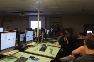 Students listen in Helga Brown's class while she teaches on Wednesday, Sept. 14.