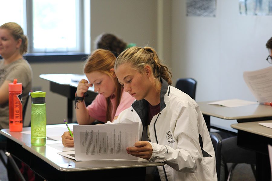 While taking an AP Euro test, senior Meg Green and sophomore Josie Carey focus on selecting the right answers. “I felt like I knew the material [on the test] very well,” Carey said.  