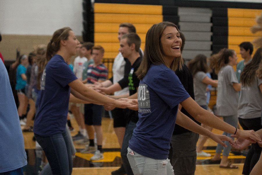 Junior Brynn Rittenhouse excitingly learns how to swing dance at the StuCo conference on Tuesday, Sept. 20.