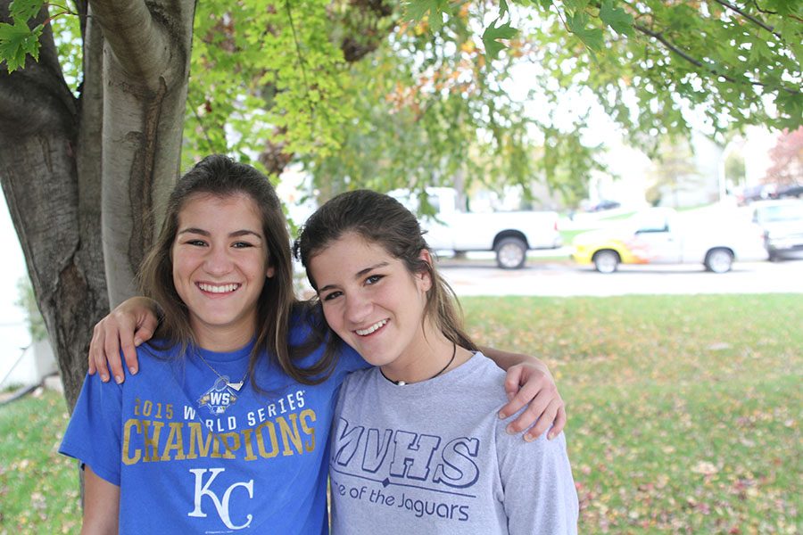 Juniors Alyssa Noel and Sam Noel, stand outside their house on Wednesday, Oct. 19. “We switched schools for the first time pretty much halfway through the year, which was a really weird experience for us, but it got better the more we’ve moved,” Alyssa Noel said. “I haven’t moved schools in awhile though, which has been a really nice change of pace.”