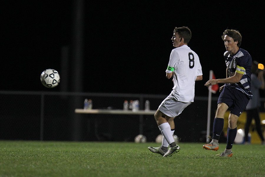 Senior Hayden Vomhof passes the ball to an open player.