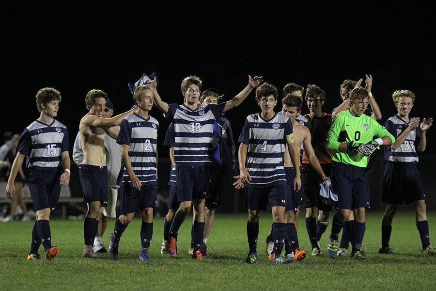 After a successful game, the team strides onto the field.