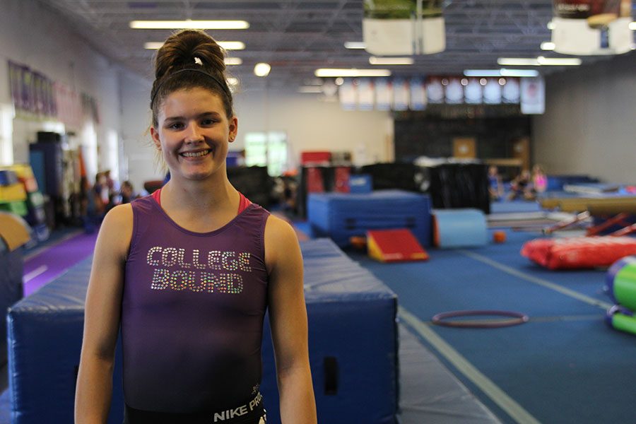 Standing+in+her+gymnastics+gym+on+Wednesday+Oct.+19th%2C+junior+Haley+Minor+shares+her+experiences.++Some+of+the+hardest+things+about+gymnastics+are+keeping+your+skills+consistent+and+building+up+strength+during+competition+season.+Minor+said.+