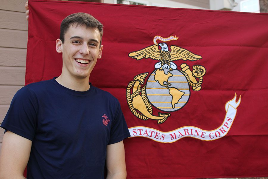 On+Thursday+Oct.+27th%2C+senior+Bryce+Dean+stands+with+his+Marine+Corps+flag.+I+knew+I+wanted+to+serve+my+country%2C+Dean+said.+I+figured+if+I+wanted+to+do+it%2C+the+best+branch+was+the+Marine+Corps.+
