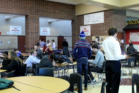 While waiting to go into their individual debates students from many different schools prepare in the commons.