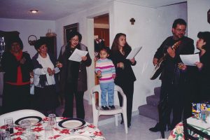 At her grandmother's house, Torres rings bells and sings with members of her posada. (submitted photo)