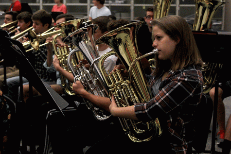 During class on Tuesday, Nov. 8, senior Kristen Shau plays the euphonium with her section.