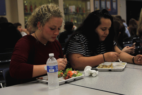 Sophomores Grace Goetsch and Claire Segura eat lunch together on Thursday, Nov. 3.