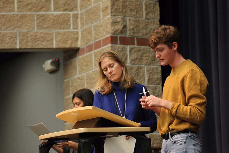 President of the National Spanish Honor Society, senior Ben Hoepner practices his address to the inductees during the rehearsal of their induction ceremony on Monday, Nov. 14.
