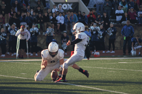 To score the game-winning point, sophomore Jack Matchette kicks the extra point.