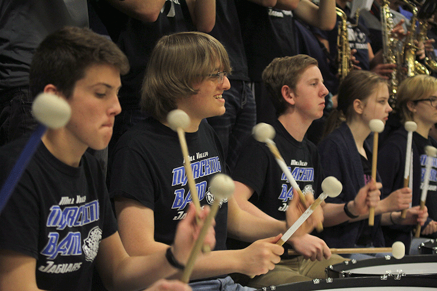 Before the start of the game, senior Derek Simms plays the fight song.