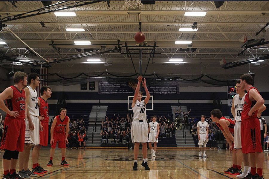 Senior Jack Cooper does a free-throw. 