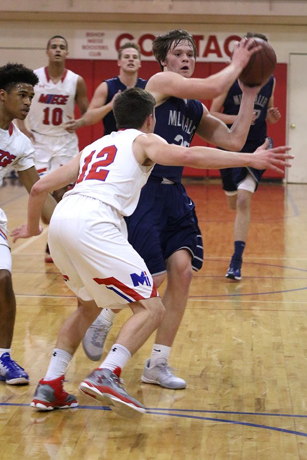 Junior Cooper Kaifes looks for an open teammate on Wednesday, Jan. 25. 