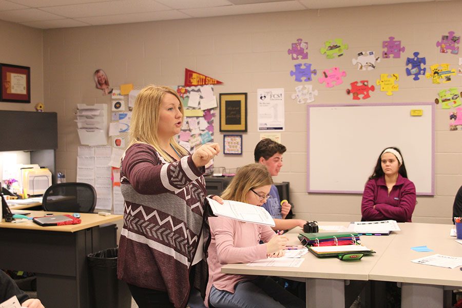 Family and Consumer Sciences teacher Emily Schmidt observes her students as she teaches them SMART goals, which are life planning skills.
