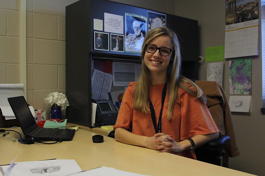 English teacher Heathyr Shaw smiles at her desk after receiving the Kansas Horizon Award on Tuesday Jan. 10. "Coming here as a first year teacher I worked with so many amazing colleagues, especially the whole English department, and it was just so great, they all supported me in so many ways. I’m so thankful to be in this kind of school," Shaw said.