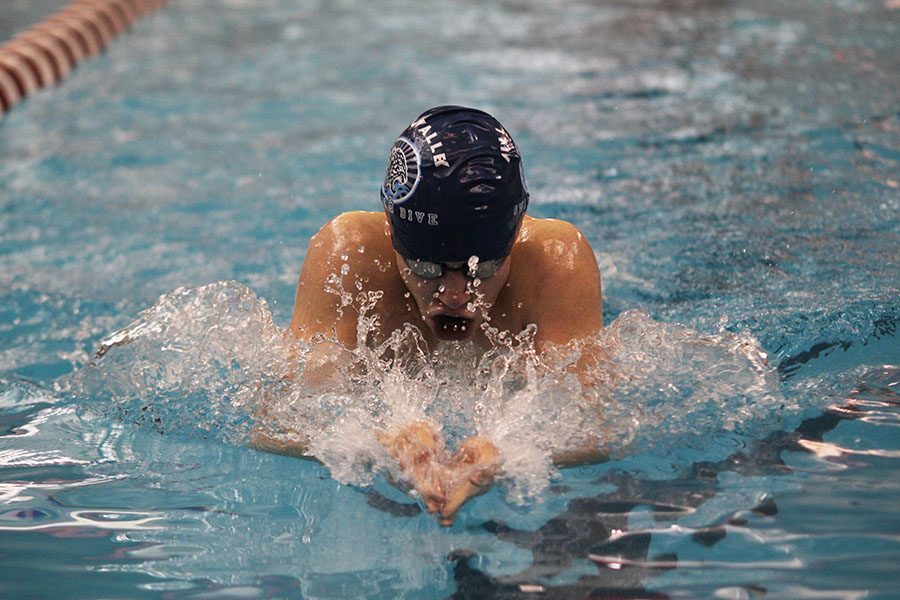 In the Individual Medley, sophomore Chris Sprenger performs the breast stroke at the Blue Valley West on Thursday, Jan 26.  