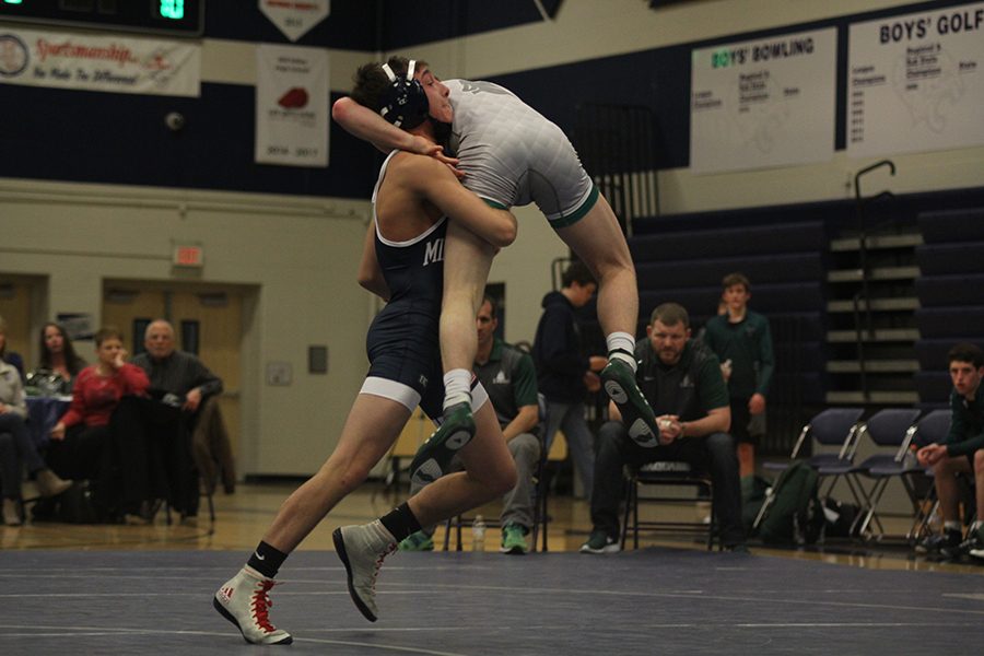 Picking up his opponent, senior Dylan Gowin takes down his competitor from BVSW. The wrestlers lost their dual 33-34. 