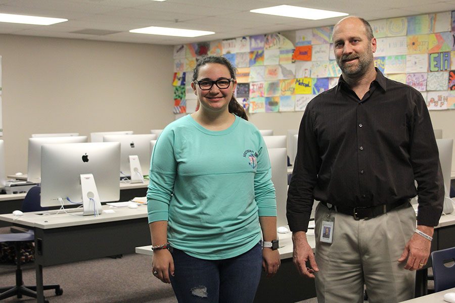 Before school, senior Meghan Clark meets in art teacher Jerry Howards classroom with other seniors to have a group breakfast. I enjoy building relationships with people that come to our Breakfast Club, Clark said. It really helps [us] to start off each day with a bit of positivity.