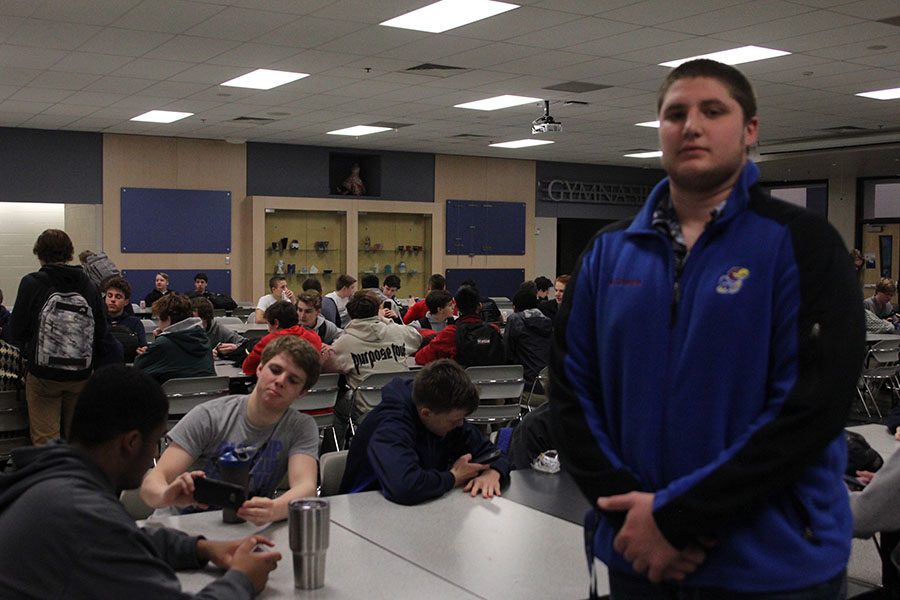 Senior Jacob Campbell enjoys spending time in the cafeteria with his fellow football teammates after morning workouts. 