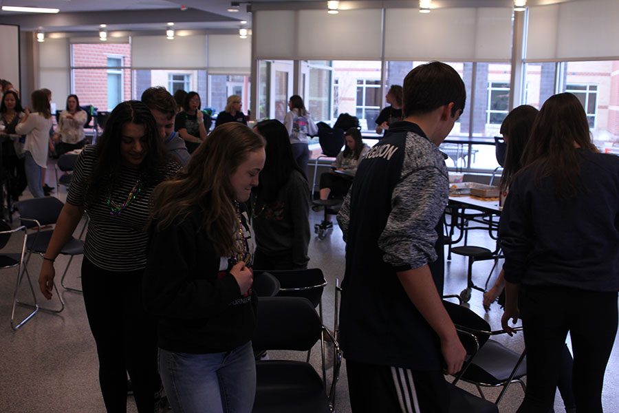 Students play musical chairs at Mardi Gras on Friday, Feb. 24.