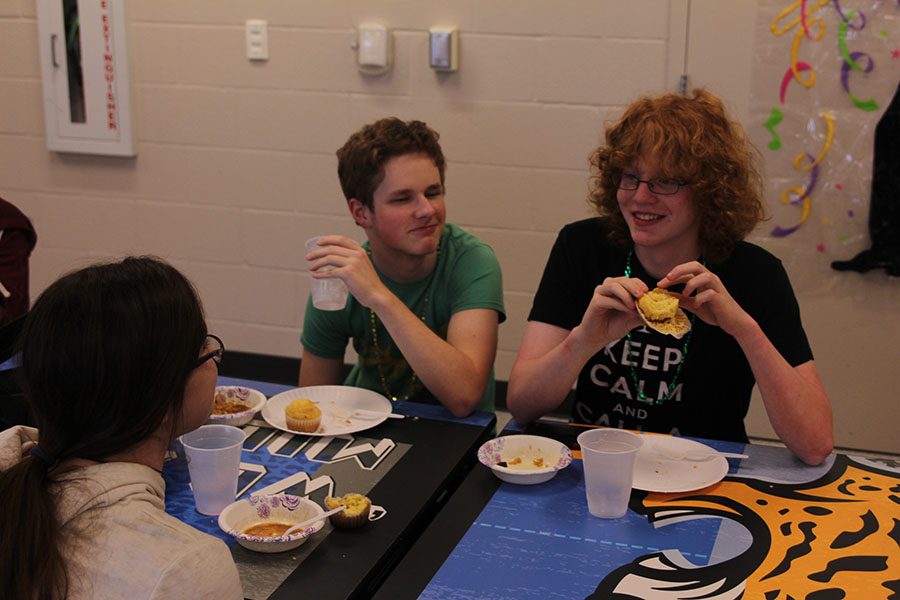 Sophomore Jackson Linton and freshman Griffin Schenk enjoy talking over food at Mardi Gras on Friday, Feb. 24.