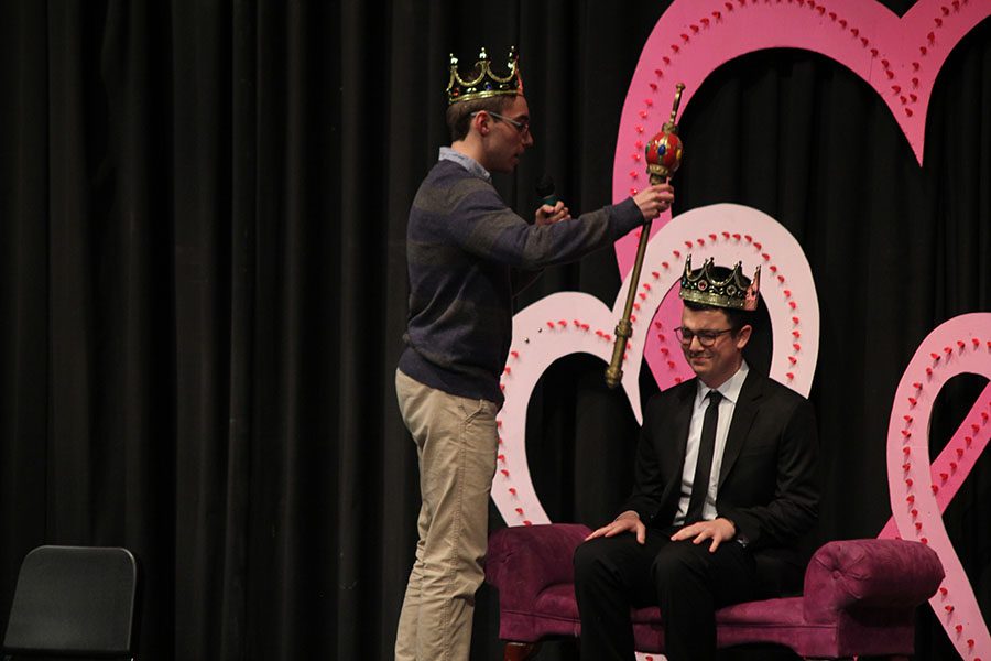 After announcing the new Mr. Mill Valley, senior Tom McClain dubs senior Collin Petigna.