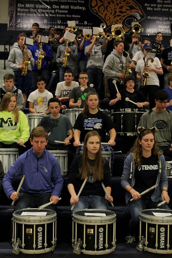 The pep band plays as students walk in for the pep assembly.