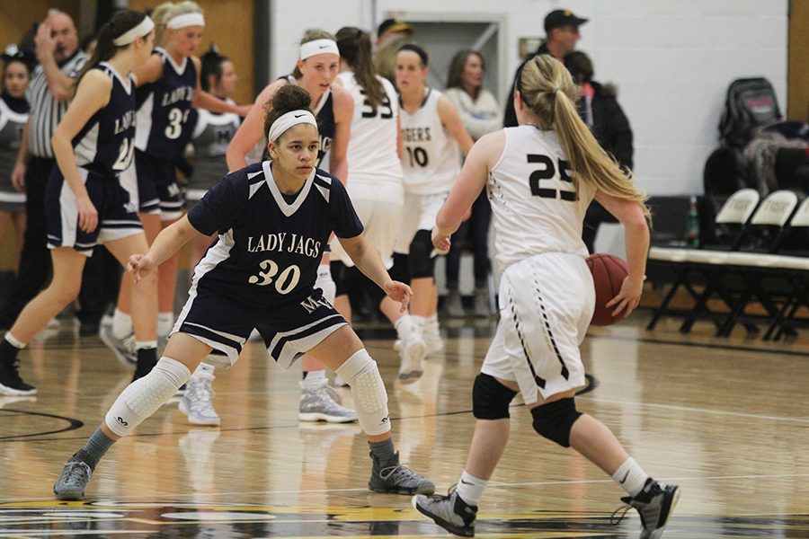 Keeping her eyes focused, senior Elena Artis squares up to her opponent.
