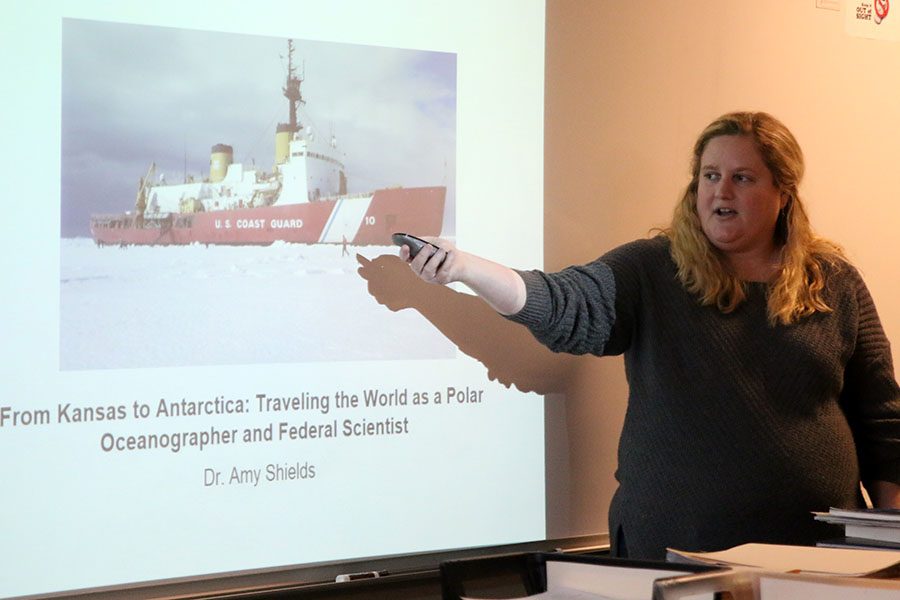 Gesturing+towards+the+board%2C+Dr.+Amy+Shields+uses+a+powerpoint+as+an+aid+to+speak+to+the+Marine+Biology+club+about+her+time+in+Antartica+on+Wednesday%2C+February+8.