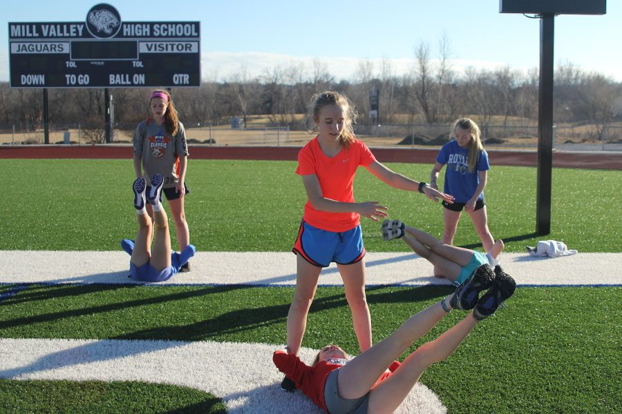 During soccer winter training freshman Emerson Kaiser workout with freshman Morgan Kocas on Wednesday, Jan. 18. I run three times a week because the other two days i’m working out with the soccer team. Kaiser said.