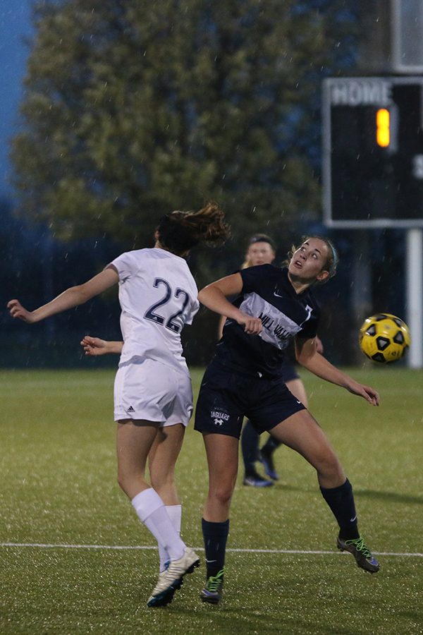 Junior Madison Irish looks for the ball after it was kicked upfield.