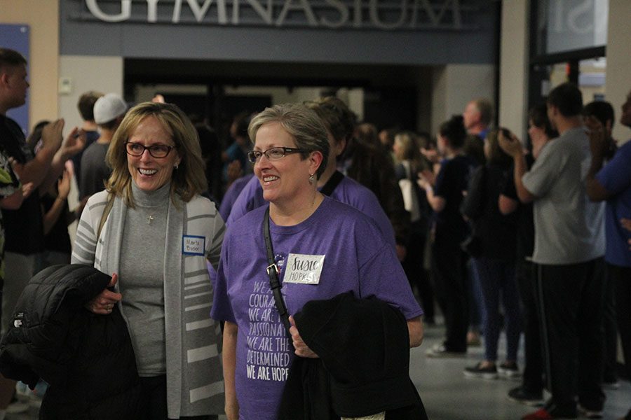 Survivors participate in the survivor walk. 