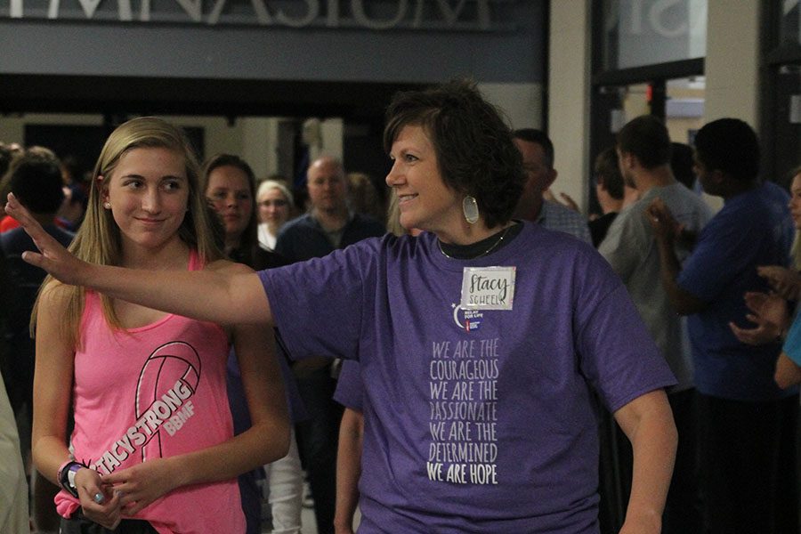 Cancer survivor Stacy Scheelk, mom of freshman Mallory Scheelk, participates in the survivor walk.