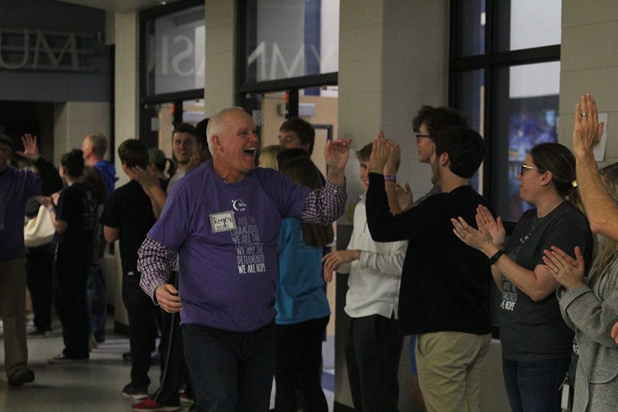 Retired Mill Valley teacher Roger Bruns participates in the survivor walk. 