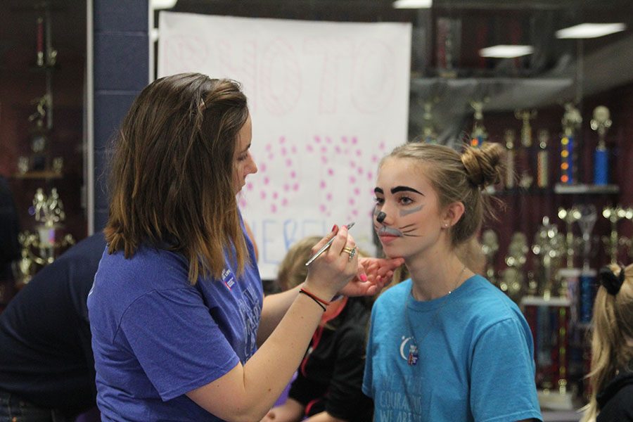 Students in the community participate in fundraising activities. 