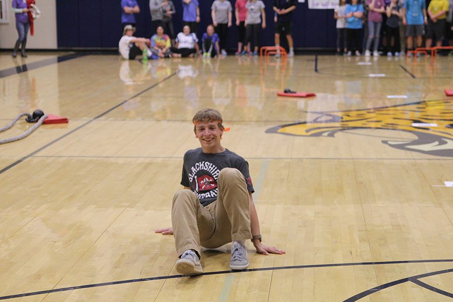 Junior Carter Lawson participates in an obstacle course. 