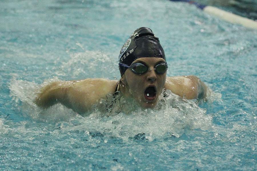 During her butterfly stroke, senior Payton Frye comes up for a breath of air on Wednesday, March 29.