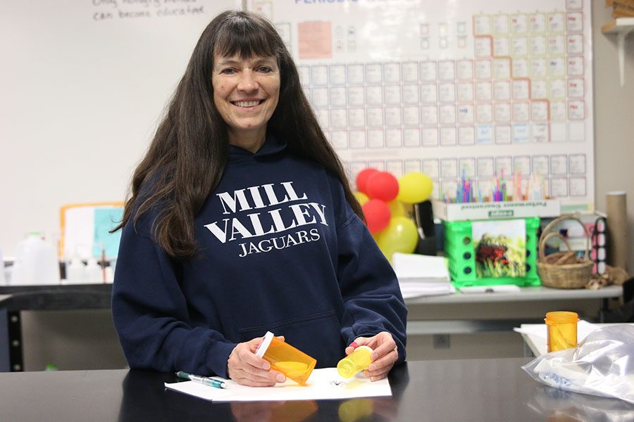 Substitute teacher Diane Barger researches spiders found in her home