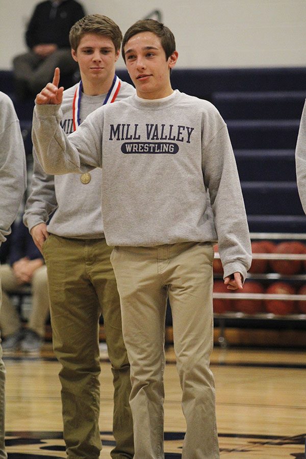 After the Silver Stars dance routine, senior Dylan Gowin gets recognized for his wrestling state title.
