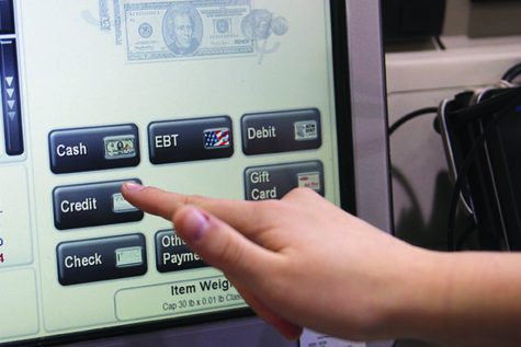 Students evaluate personal knowledge of credit, debit cards