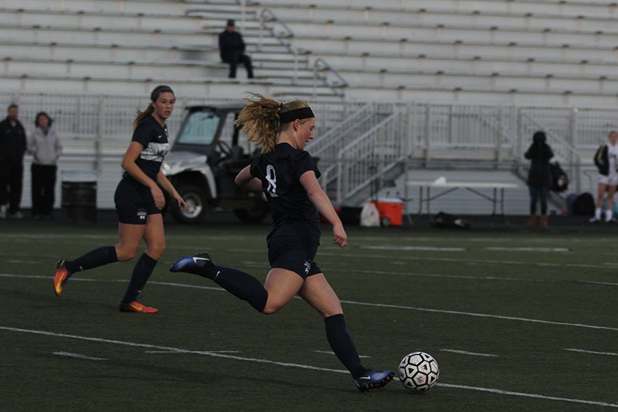 Ankle ready, sophomore Ally Klaudt kicks the ball head-on.