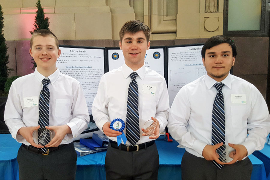 Seniors+Hanavan+Kuhn%2C+Eric+Tibbitts+and+Matt+Dennis+pose+with+their+awards+at+the+Project+Lead+the+Way+and+Engineering+Design+and+Development+Senior+Showcase+on+Tuesday%2C+April+18.+Photo+submitted+by+Gayle+Kebodeaux.