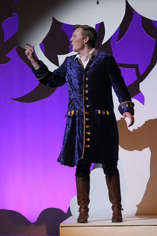 Cinderellas prince, played by senior Brady Rolig, sings Agony.