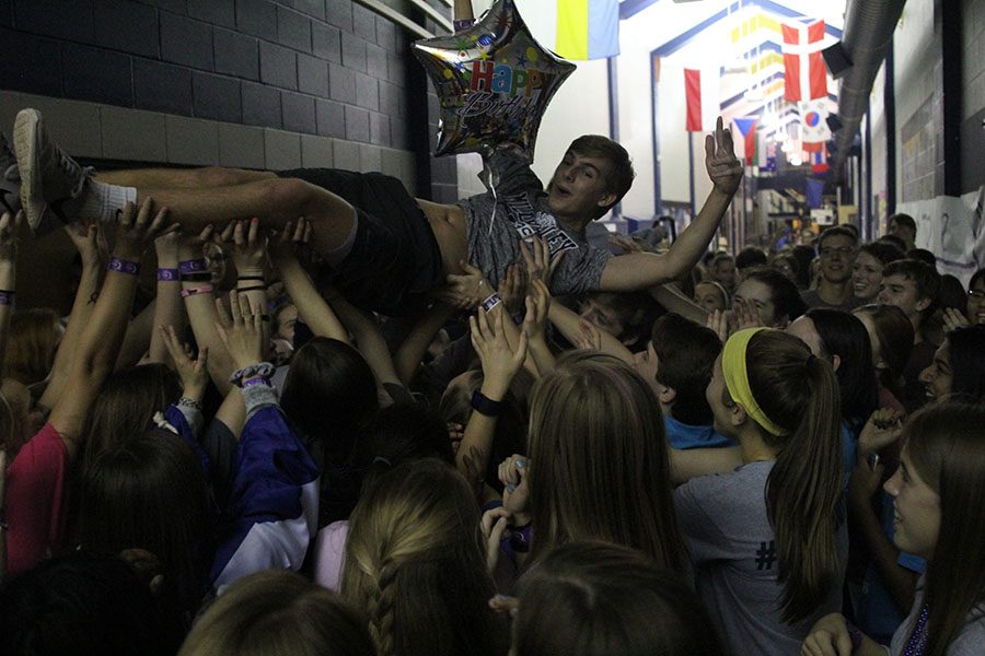 Students participate in a dance party. 