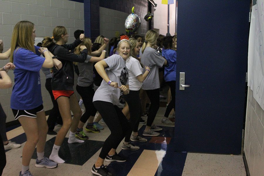 Senior Emma Dandridge participates in a dance party. 