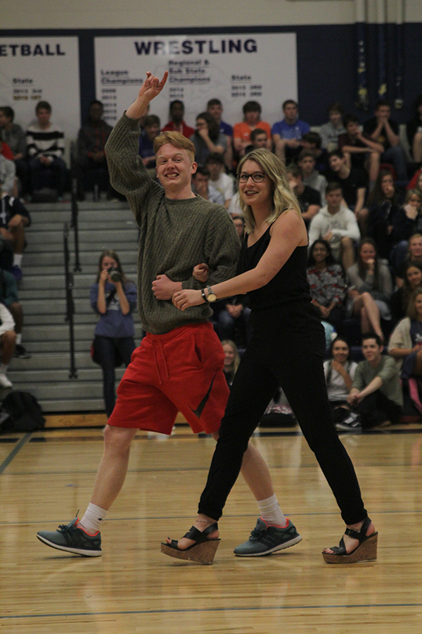 Seniors Austin Geise and Emma Mantel are walk out as they are recongnized as prom king and queen candidates.