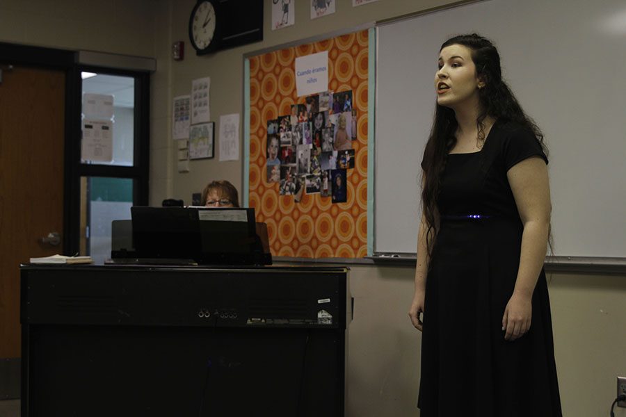 Singing a solo, junior Lauryn Hurley qualifies for state at the regional competition on Saturday, April 8