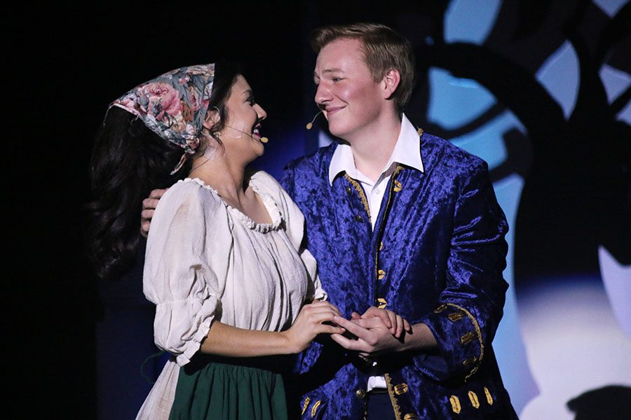 Cinderella, played by senior Natalie Carrera, and the Prince, played by senior Brady Rolig, smile after ending up together. 
