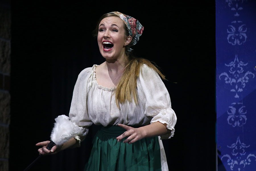 During the opening scene of "Into the Woods," Cinderella, played by junior McKenna Harvey, sings the Prologue.