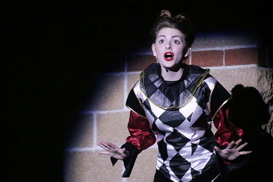 The Narrator, played by junior Natalie Cooper, introduces the spring play "Into the Woods," on Monday, April 24.